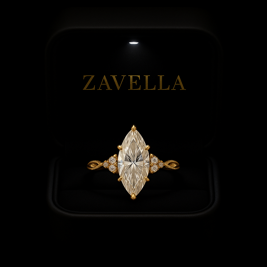 Gold ring with a large diamond on a black background with 'Zavella' branding.