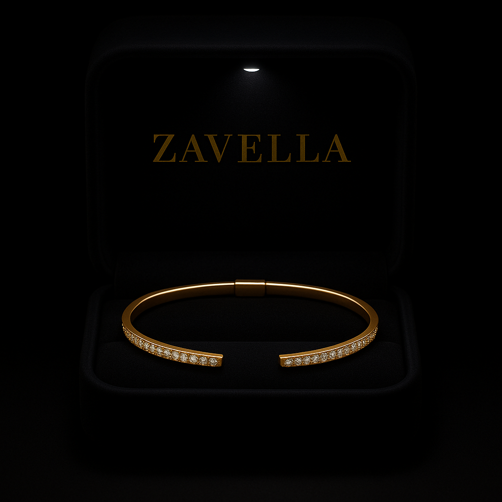 Gold bracelet with diamonds on a black background with 'Zavella' branding.